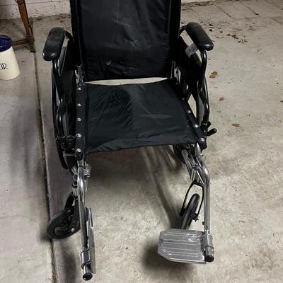 GARAGE -- Invacare Wheel Chair. 