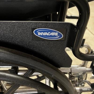 GARAGE -- Invacare Wheel Chair. 