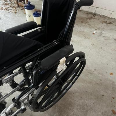 GARAGE -- Invacare Wheel Chair. 
