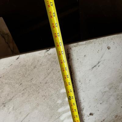 Behind GARAGE -- 3 Pieces of Marble 
