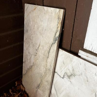 Behind GARAGE -- 3 Pieces of Marble 
