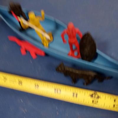 LOT 117   MPC CANOE BOAT WITH NATIVES AND HUNTER