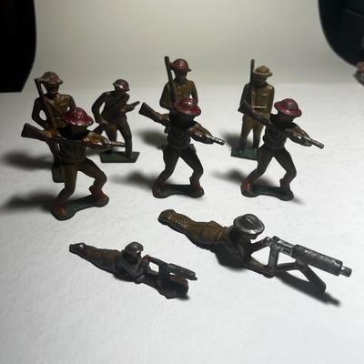 Lot of 9 Grey Iron Soldiers