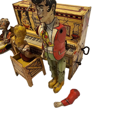 Tin toy wind up lil abner and his dogpatch band