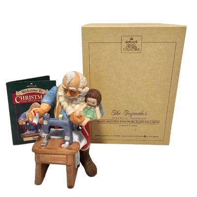 santa sewing porcelain figurine