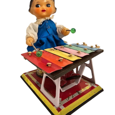 wind up tin toy musical