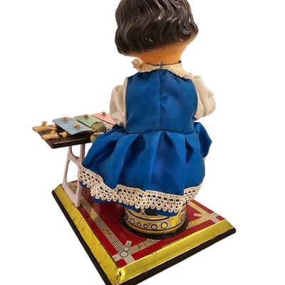 wind up tin toy musical