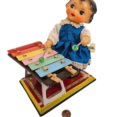 wind up tin toy musical