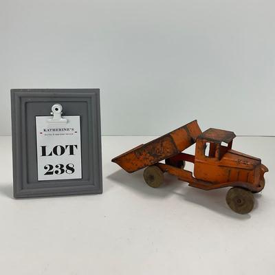-238- TOY | 1930â€™s Metal Orange Dump Truck