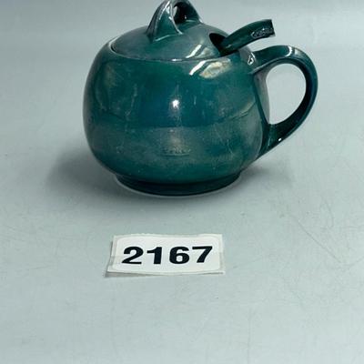 Ceramic glass with top and spoon