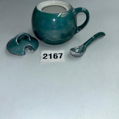 Ceramic glass with top and spoon