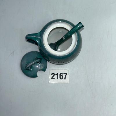 Ceramic glass with top and spoon