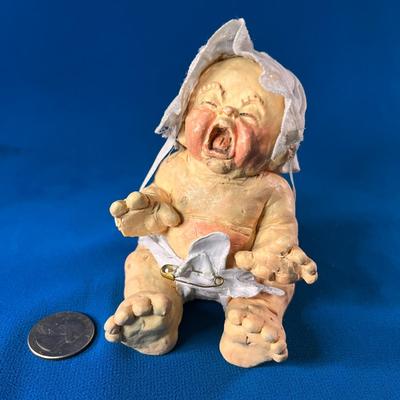 ARTIST SIGNED AND NUMBERED WAILING BABY FIGURINE