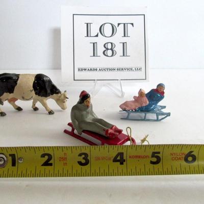 3 Vintage Lead Christmas Figures, People on Sleds, Cow