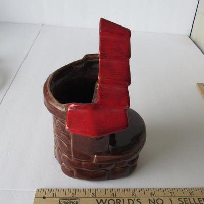 Lot 246:  Old Pottery Wishing Well Planter