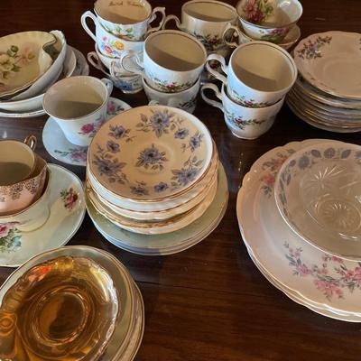 Large lot of china and tea cups