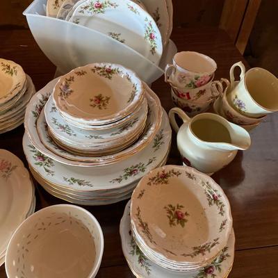 Large lot of china and tea cups