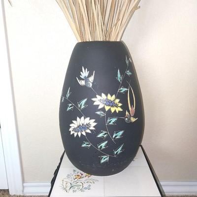 SIGNED POTTERY VASE ON TILE CAST IRON STAND