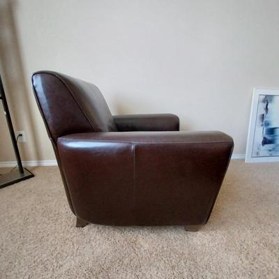 LEATHER ? ARM CHAIR AND OTTOMAN