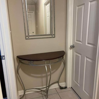 Beautiful Mirror and console table.mirror measures 32â€ high & 22â€ wide. Table measures 36â€ wide and 32â€ high.