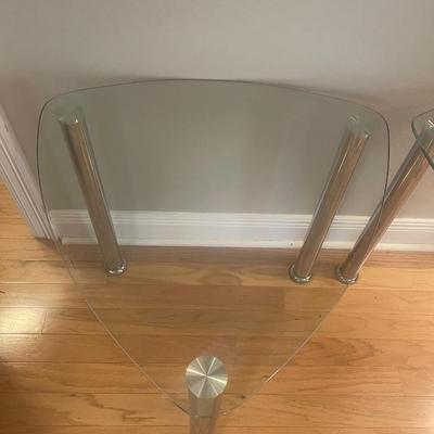 Pair of  beautiful Mid-century modern triangle -shaped glass top end tables. 24 â€œ high 26â€ across   Tempered heavy glass. MCM...