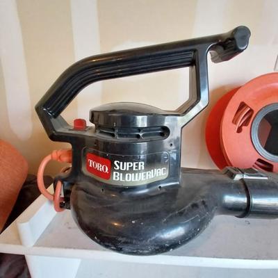 TORO SUPER BLOWER VAC WITH BAG AND EXTENSION CORD ON REEL