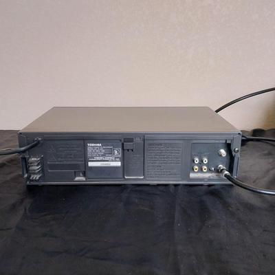 TOSHIBA VHS PLAYER WITH REMOTE AND VHS TAPES