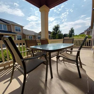 GLASS TOP PATIO TABLE WITH 5 CHAIRS