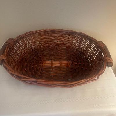 Sturdy Oval basket with handles. 16â€ x 12â€ x 4â€
