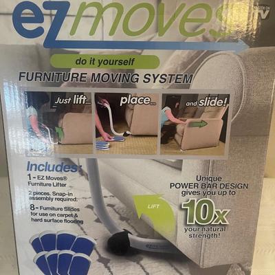 EZ MOVES Do it Yourself furniture moving system. Includes 1 furniture lifter, 4 furniture slides. Never used.