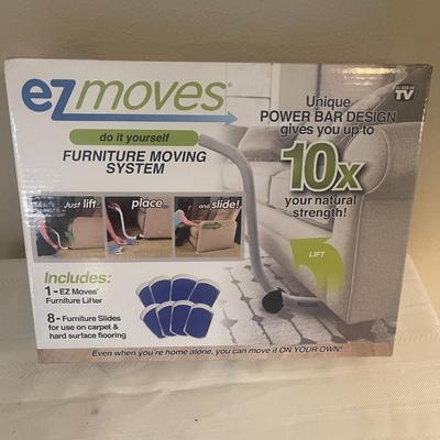 EZ MOVES Do it Yourself furniture moving system. Includes 1 furniture lifter, 4 furniture slides. Never used.