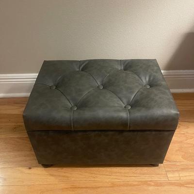 Very pretty charcoal gray ottoman. Perfect condition. Like new. Great storage.