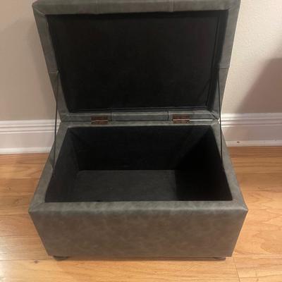 Very pretty charcoal gray ottoman. Perfect condition. Like new. Great storage.