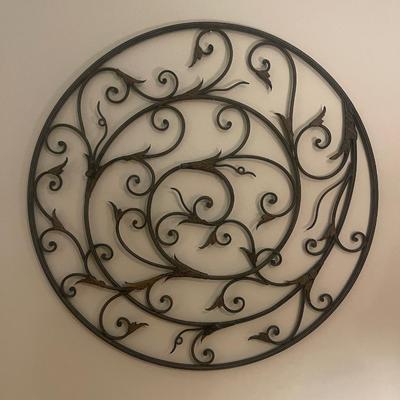 Large bronze metal round wall decor.  39â€ top to bottom and side to side.