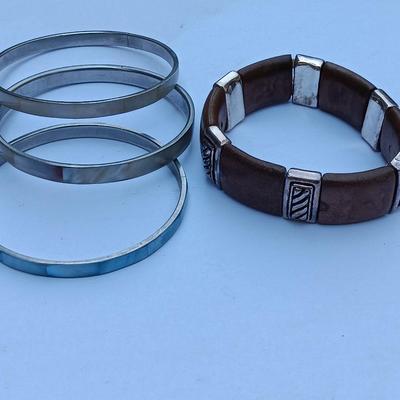 Four bangle bracelets