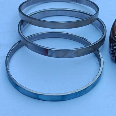 Four bangle bracelets