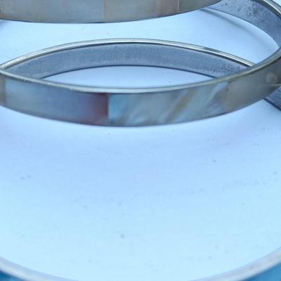 Four bangle bracelets