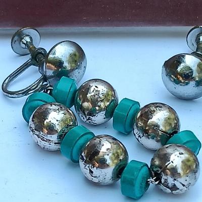 Matted and signed print with Jewlery