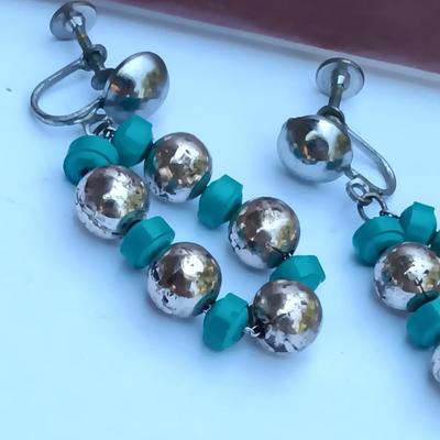 Matted and signed print with Jewlery