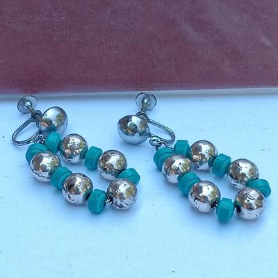 Matted and signed print with Jewlery