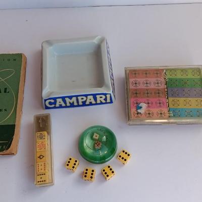 Vintage Lake Taho paper weight with dice, cards, and more