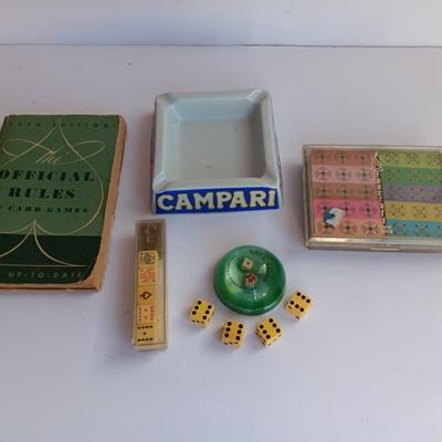 Vintage Lake Taho paper weight with dice, cards, and more