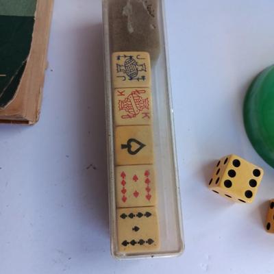 Vintage Lake Taho paper weight with dice, cards, and more