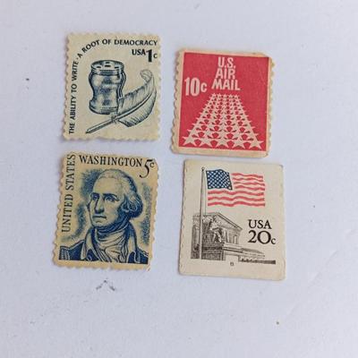 Four vintage postage stamps