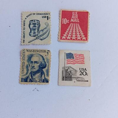 Four vintage postage stamps