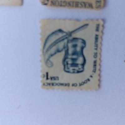 Four vintage postage stamps