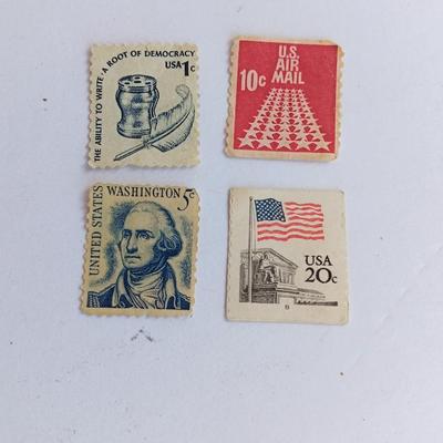 Four vintage postage stamps