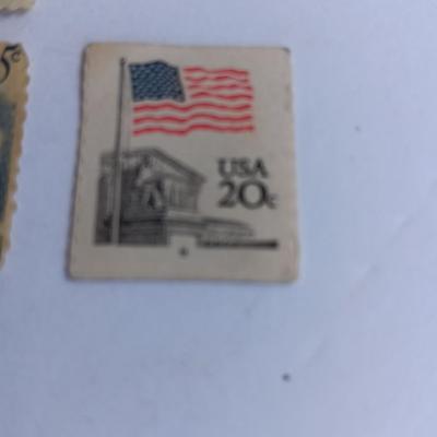 Four vintage postage stamps