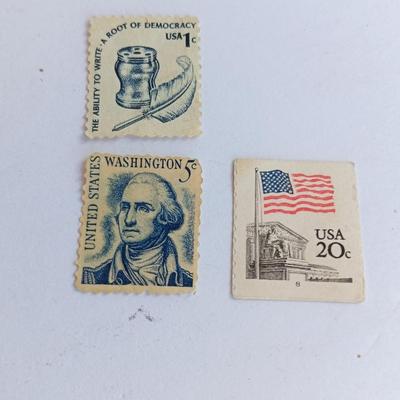 Four vintage postage stamps