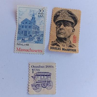 Three vintage postage stamps